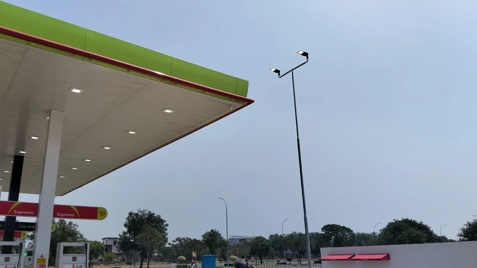 Street light pole beside the Attock Petroleum Lake City canopy