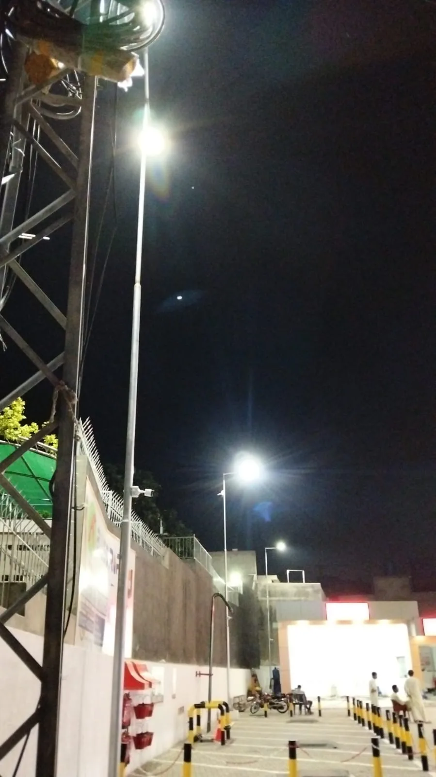 Crest LED street light poles along the Attock Petroleum Wahdat Road perimeter
